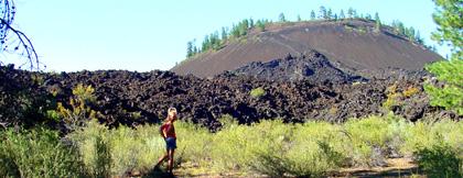 Summer with lava flow and cinder cone in background